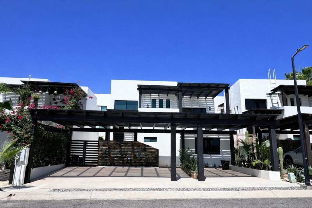 Los Cabos Pescadero Casa Soledad #3 Welcome to Pueblo Pescadero — where desert serenity meets ocean breeze and refined Baja living blends seamlessly with nature. This beautifully designed 3-bedroom, 2.5-bath residence offers the best of coastal comfort just minutes from Cerritos and San Pedrito beaches. Created by architect Hiram Arce, the home merges traditional Mexican craftsmanship with clean, modern lines—showcasing open living spaces filled with natural light and effortless indoor-outdoor flow. All bedrooms are conveniently located on the ground floor for cool, restful nights, while the upper level opens into an expansive great room and two large decks that extend the living space outdoors. The ocean-facing terrace captures panoramic Pacific – 12 isla santa margarita, Cabo Corridor, BS