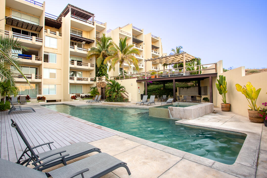 Los Cabos Three Point Tower Experience elevated living in this one-of-a-kind turnkey penthouse in downtown Cabo--only 3 penthouse condos in the building. Fully furnished 2BD/2.5BA with designer finishes, two oversized closets, and two secured garage spots behind a mechanic gate and secured entry door. Built in 2023, this stylish retreat offers peace of mind and comfort. Enjoy panoramic bay and city for sale