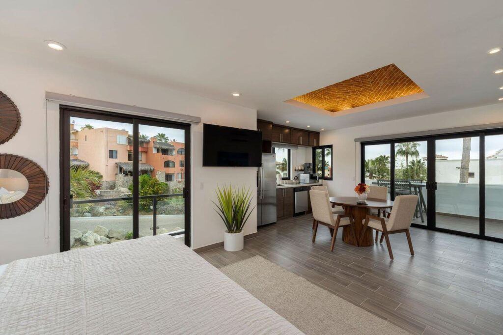 Los Cabos Los Valles Sophisticated and solidly built, this 5,588 sq.ft. estate in Club Campestre offers luxury living with exceptional construction quality rarely found in Los Cabos. Residents enjoy exclusive access to a private beach club and world-class golf course, all just minutes from San Jose vibrant dining and culture. The home features 4 ensuite bedrooms, a 3-stop elevator, and a Generac backup system. Entertain in style with a chef's kitchen, wine room with Tzalam wood cabinetry, and an outdoor BBQ area with fire pit. Relax by the heated pool or on the Jacuzzi terrace with partial ocean – 9 Camino a la Playa, Cabo Corridor, BS