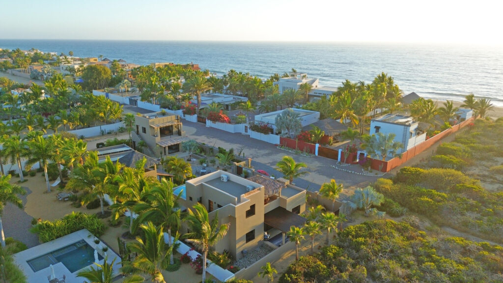 Los Cabos Cumbre Del Tezal Luxury finishes include marble flooring, wood kitchen with granite countertops, built-in wooden closets in all bedrooms, and vanities with tempered glass shower doors in all 3.5 baths. Fully equipped with 5 Gree inverter mini-split A/C units (3 × 1-ton, 2 × 2-ton), LG 22' French Door refrigerator, Whirlpool gas stove, and 1.7 cu ft microwave hood. Additional features: rooftop with bar, grill & sink, private terrace, storage, WiFi smart lock, private 5,000-liter cistern, and termite prevention system. Community: pool, gym, sports courts, kids' area, 3 clubhouses & 24/7 gated security – ALMA GITANA, Pacific, Pacific, BS