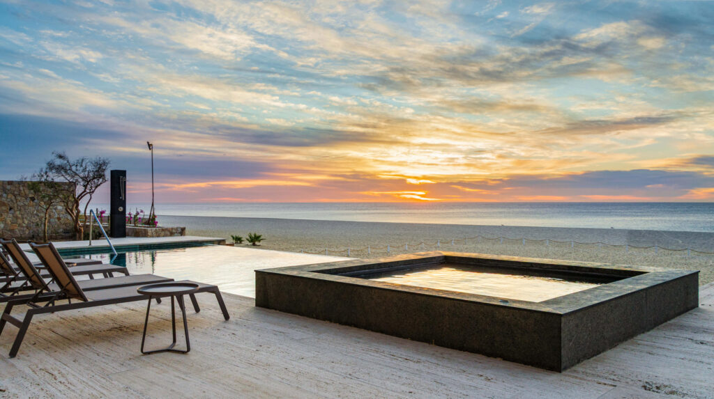 Los Cabos La Reserva At Querencia Welcome to La Reserva in Los Cabos Querencia, by Tempo Development. This sixteen-unit boutique development sits on two-acres and is due for completion in spring of 2026. These three-bedroom, plus study residences are carefully designed with on-site amenities, including the owners' indoor-outdoor fitness center, heated pool with jetted-spa, and owner's lounge. Querencia offers a Tom Fazio golf course and top class club amenities. La Reserva is in the Horizantes subdivision, three minutes from the entry gate and beach club, and five minutes to the club village. See Supplement. Features:Other features include an open floor-plan, ten foot high ceilings, professional kitchen with waterfall island and laundry room. The finishings reflect the natural surroundings with travertine marble floors, Parota and Oak wood cabinets and doors, neutral color pallet, and flagstone rock walls. The air-conditioned space is 2,800 square feet plus a terrace area of 667 square feet. Owners qualify to apply for a social or golf membership. Querencia recently completed its owners beach club with easy access from within the gates. La Reserva has been mindfully designed by Carranza Ruiz Arquitectos and developed by Tempo Development. Construction began this last March of 2024. Payment terms – Bahia de Palmas, San Jose del Cabo, BS