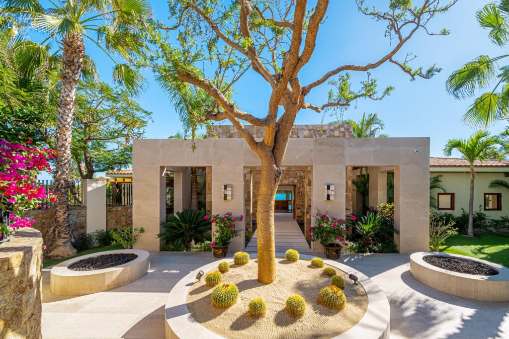 Los Cabos Los Valles Sophisticated and solidly built, this 5,588 sq.ft. estate in Club Campestre offers luxury living with exceptional construction quality rarely found in Los Cabos. Residents enjoy exclusive access to a private beach club and world-class golf course, all just minutes from San Jose vibrant dining and culture. The home features 4 ensuite bedrooms, a 3-stop elevator, and a Generac backup system. Entertain in style with a chef's kitchen, wine room with Tzalam wood cabinetry, and an outdoor BBQ area with fire pit. Relax by the heated pool or on the Jacuzzi terrace with partial ocean – Caleta 58, San Jose Corridor, BS