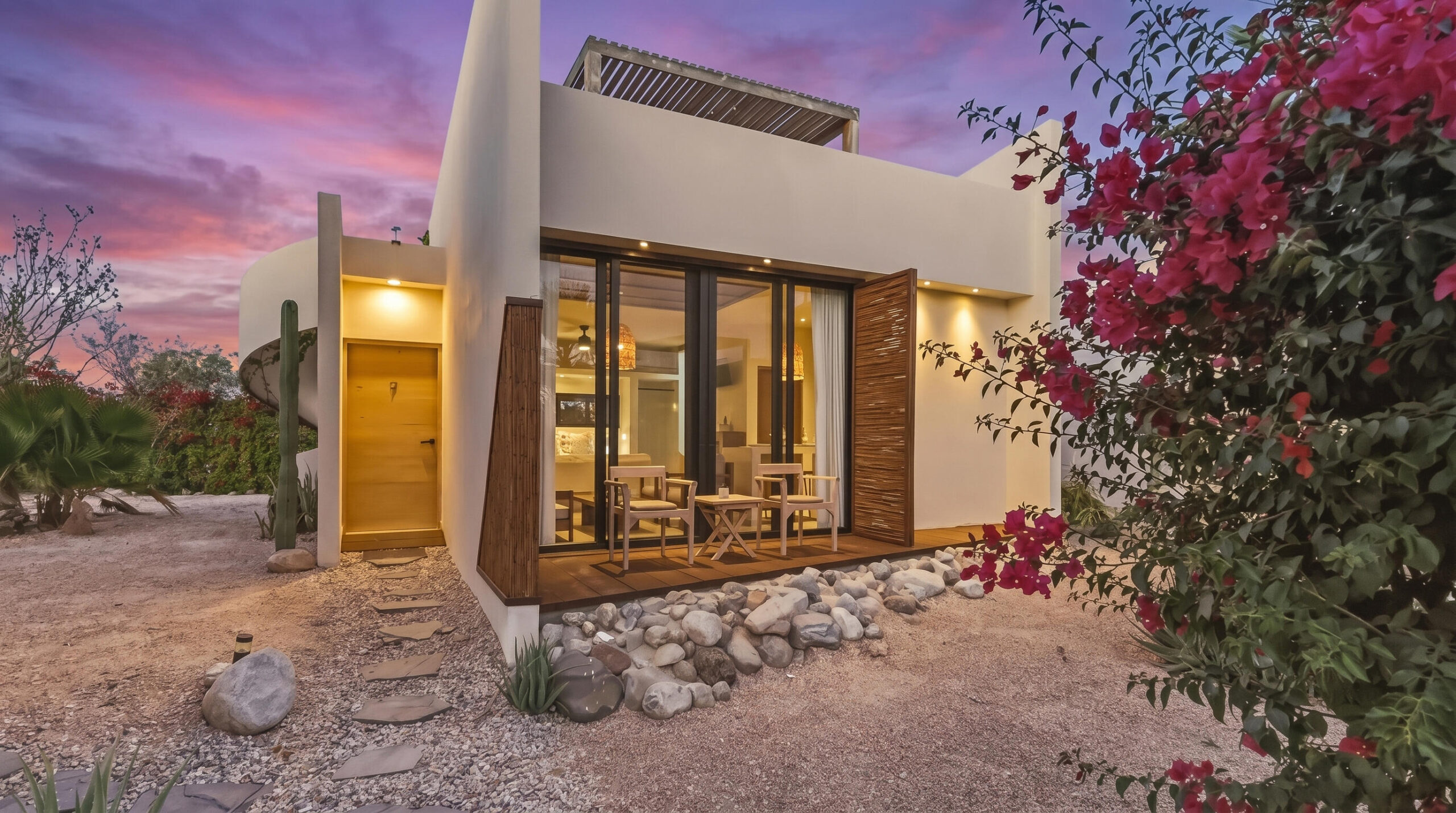 Los Cabos El Posito We are excited to introduce Casa Elisabeth, an amazing, newly constructed custom home in the private El Posito area of Todos Santos. Located just three rows back from the beach, this three-bedroom, three-full and two-half bathroom residence offers every amenity desired for a tropical paradise. The downstairs features an open-concept living room, dining room, and a fully stocked kitchen with brand-new appliances, including a dishwasher. The main floor also includes a laundry room and an outdoor water feature with a professionally designed rock wall. The principal bedroom downstairs offers a unique indoor/outdoor bathroom with two showers and an outdoor bathtub.Each of the three bedrooms includes an en-suite bathroom with double vanities. The upstairs bedroom features its own private furnished terrace and access to one of four large patios, complete with a bar area and outdoor furniture perfect for enjoying ocean sunsets. Additionally, a shaded third-floor observation deck provides panoramic ocean and mountain for sale