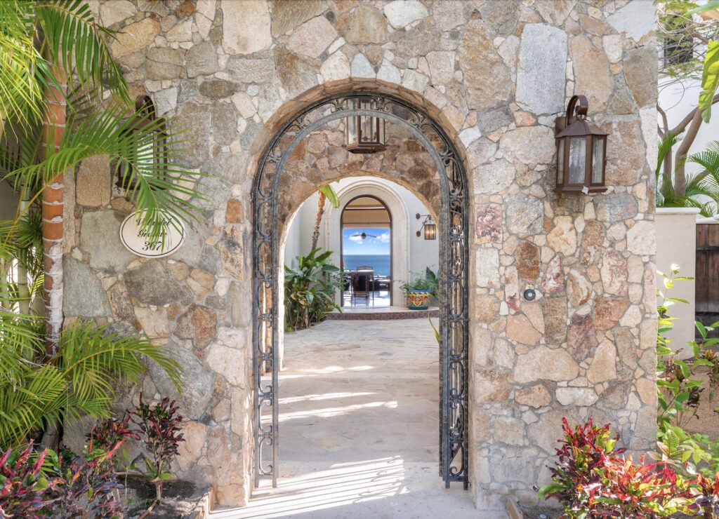 Los Cabos Los Valles Sophisticated and solidly built, this 5,588 sq.ft. estate in Club Campestre offers luxury living with exceptional construction quality rarely found in Los Cabos. Residents enjoy exclusive access to a private beach club and world-class golf course, all just minutes from San Jose vibrant dining and culture. The home features 4 ensuite bedrooms, a 3-stop elevator, and a Generac backup system. Entertain in style with a chef's kitchen, wine room with Tzalam wood cabinetry, and an outdoor BBQ area with fire pit. Relax by the heated pool or on the Jacuzzi terrace with partial ocean – De Las Estrellas, Cabo San Lucas, BS