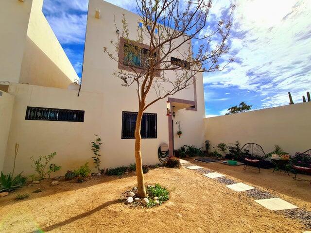 Los Cabos Csl N-E Of19:Genral GREAT INVESTMENT OPPORTUNITY - ENDLESS POSSIBILITIES!Discover the untapped potential of Casa Altezza, a single-family Two-story home nestled in a sought-after residential community - Northern Cabo San Lucas, and conveniently located off Highway 19-Tamaral Ave. What sets this property apart? THE LARGEST LOT in the cluster! Offering unique development potential! Expand the current home, add residential rental-rooms, design a covered garage, or build the ultimate entertainment space with seamless access--this property's extra land is a blank canvas for creativity and investment. Completed in April 2022, Casa Altezza features 3 bedrooms and 2.5 bathrooms, including an ensuite bath in the master bedroom. The home boasts a spacious front patio with mature plants and trees, along w/a back patio including concrete flooring.Several thoughtful upgrades include: - Custom-designed kitchen with a modern, minimalist concept and an expanded window for ample natural light. - Enclosed bonus room for laundry and storage. - High 2.5-meter privacy walls surrounding the property. - Iron-protected doors and windows with installed screens. - Abundant water supply with a total of 23,700 liters, including two cisterns and a rooftop water tank. - New appliances, including a full-size washer & dryer, stove, hood, refrigerator, two inverter mini-splits, and ceiling fans.Casa Altezza sits in an ideal location, just 10 minutes from downtown Cabo San Lucas, Medano Beach, Puerto Paraiso Mall, and The Marina. Daily conveniences like supermarkets, shopping centers, medical facilities, and schools are just minutes away. Plus, the community is a gated neighborhood with electronic access, and a remarkably low HOA monthly fee of only for sale