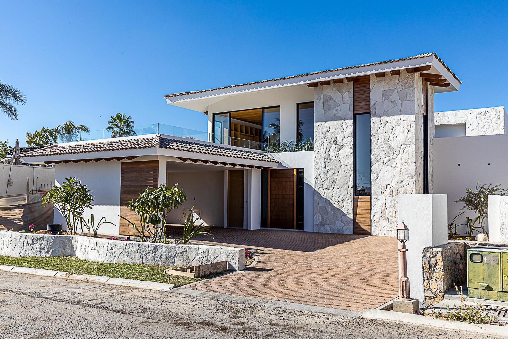Los Cabos Cabo Colorado Discover modern luxury in this exquisitely designed home, built in 2020 and nestled within the exclusive, beachfront, private gated community of Cabo Colorado in San José del Cabo—just 2 miles from Palmilla Beach. Enjoy the convenience of living just steps from a stunning, sandy private beach within the community.With a striking contemporary aesthetic, this residence features gleaming white marble floors, beautifully appointed marble bathrooms, and captivating ocean for sale