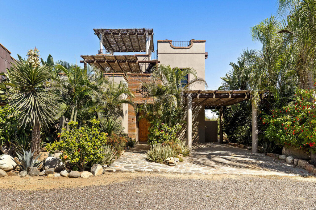 Los Cabos Pescadero Casa Soledad #3 Welcome to Pueblo Pescadero — where desert serenity meets ocean breeze and refined Baja living blends seamlessly with nature. This beautifully designed 3-bedroom, 2.5-bath residence offers the best of coastal comfort just minutes from Cerritos and San Pedrito beaches. Created by architect Hiram Arce, the home merges traditional Mexican craftsmanship with clean, modern lines—showcasing open living spaces filled with natural light and effortless indoor-outdoor flow. All bedrooms are conveniently located on the ground floor for cool, restful nights, while the upper level opens into an expansive great room and two large decks that extend the living space outdoors. The ocean-facing terrace captures panoramic Pacific – Soledad #3, Pacific, Pacific, BS