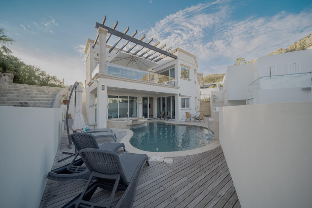 Los Cabos Fundadores Fully remodeled with entertaining in mind, Casa Reino is a stunning Spanish Colonial-style residence located within the double-gated Fundadores community of Puerto Los Cabos. Designed for hosting extended family and friends while maintaining exceptional privacy, this custom-built home blends timeless architecture with modern luxury and efficiency.An expansive pool terrace invites relaxed lounging under the renowned Los Cabos sunshine, complemented by shaded outdoor living and dining areas and multiple interior courtyards that provide privacy for guest suites. A brand-new bar, media, and entertainment room creates the perfect setting for dinner parties and special events.The thoughtful floor plan features a luxurious master suite with soaking tub and indoor/outdoor shower, along with four private guest suites, each positioned for comfort and seclusion. Modern upgrades throughout the home include all-new plumbing, air conditioning, doors, windows, lighting, and furnishings.Designed for efficiency and convenience, Casa Reino is equipped with a solar system, solar pool heater/chiller, and solar heat pump, keeping operating costs low. Additional highlights include an oversized two-car garage with commercial refrigerator and freezer, a new laundry room with dual washer/dryer sets, and a new BBQ cook center with wet bar, icemaker, and refrigeration. The pool has been newly refinished, exterior travertine decking installed, and a complete hurricane shutter system added.Residents of Puerto Los Cabos enjoy 27 holes of Nicklaus and Norman signature golf, with the option to transfer a golf membership at the purchaser's cost. Membership also includes access to tennis and pickleball courts. Fundadores HOA fees include exclusive access to the Fundadores Beach Club, featuring an oceanfront infinity pool, Jacuzzi, fitness center, event lawn, restaurant, and spa services.Ideally located just 5 minutes from the Puerto Los Cabos Marina, 10 minutes from downtown San José del Cabo, and 30 minutes from Los Cabos International Airport, Casa Reino offers effortless access to world-class dining, shopping, and lifestyle amenities.Special Features & UpgradesSolar system in placeSolar pool heater and chillerNewly remodeled pool with new finishesNew exterior travertine deckingNew bar / media / family roomNew laundry room with double washer & dryersNew air conditioning throughoutNew furnishingsNew kitchen appliances: refrigerator, two dishwashers, ice maker, beverage fridge & drawersNew sinks and faucets in kitchenSonos sound systemNew doors and windowsNew hurricane protection systemNew interior and exterior lightingCommercial refrigerator and freezer in garageNew countertops and cabinetry in kitchenette and bath at Guest Casita #4 – Villa Montana, Cabo San Lucas, Cabo San Lucas, BS